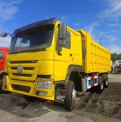 Chassi Sinotruk Caminhão de segunda mão de descarga Veículo de transporte Caminhão de descarga automática com pneus
