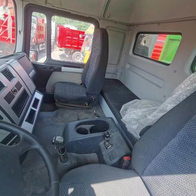 Caminhão de descarga de chassi Sinotruk de carga pesada com elevação frontal e direção hidráulica