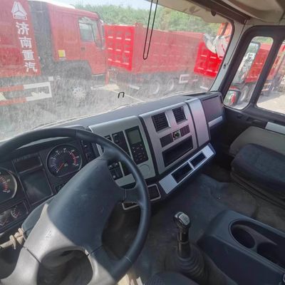 Caminhão de descarga de chassi Sinotruk de carga pesada com elevação frontal e direção hidráulica