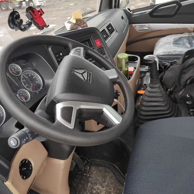 Caminhão-trator Sinotruk de segunda mão com caixa de carga de aço carbono em boas condições